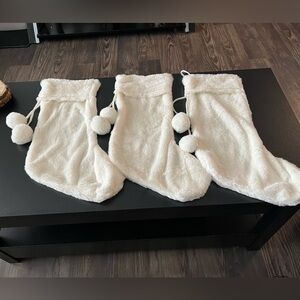 3 off white Christmas stockings